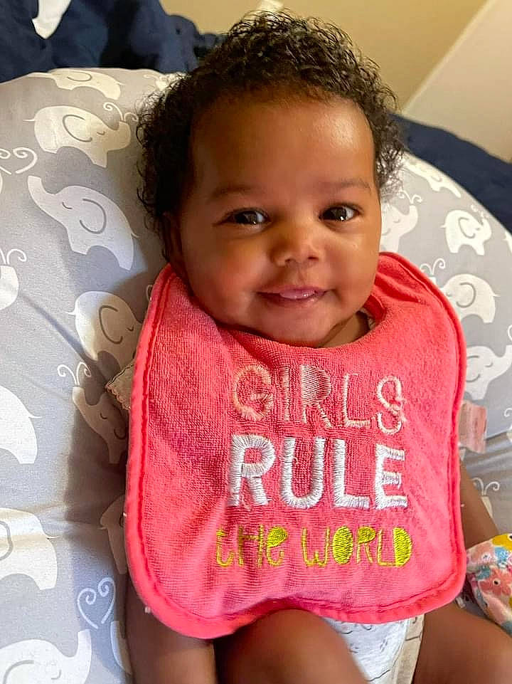 Imani joined the competition — help win amazing prizes! baby_toddler_clothing, cheek, chin, comfort, dress, eye, eyebrow, face, forehead, hair, happy, head, joy, lip, mouth, neck, nose, person, skin, sleeve