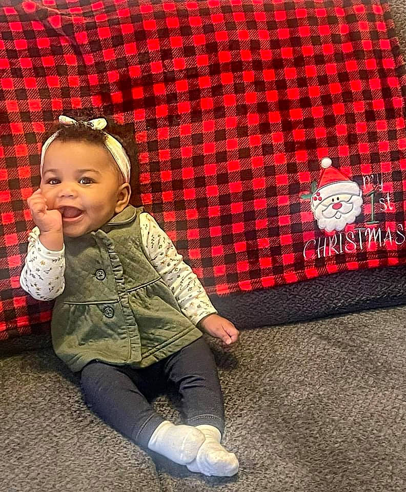 Imani joined the competition — help win amazing prizes! baby_toddler_clothing, beauty, child, cool, eye, face, fun, happy, head, human_leg, joy, knee, outerwear, pattern, person, plaid, sleeve, smile, t_shirt, tartan