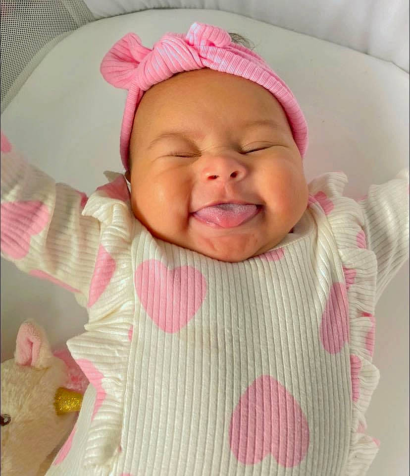 Dream is registered to the contest to win money with this photo: baby, baby_laughing, baby_products, baby_sleeping, baby_toddler_clothing, cheek, chin, comfort, eyebrow, happy, linens, lip, magenta, nose, person, pink, skin, sleeve, smile, textile