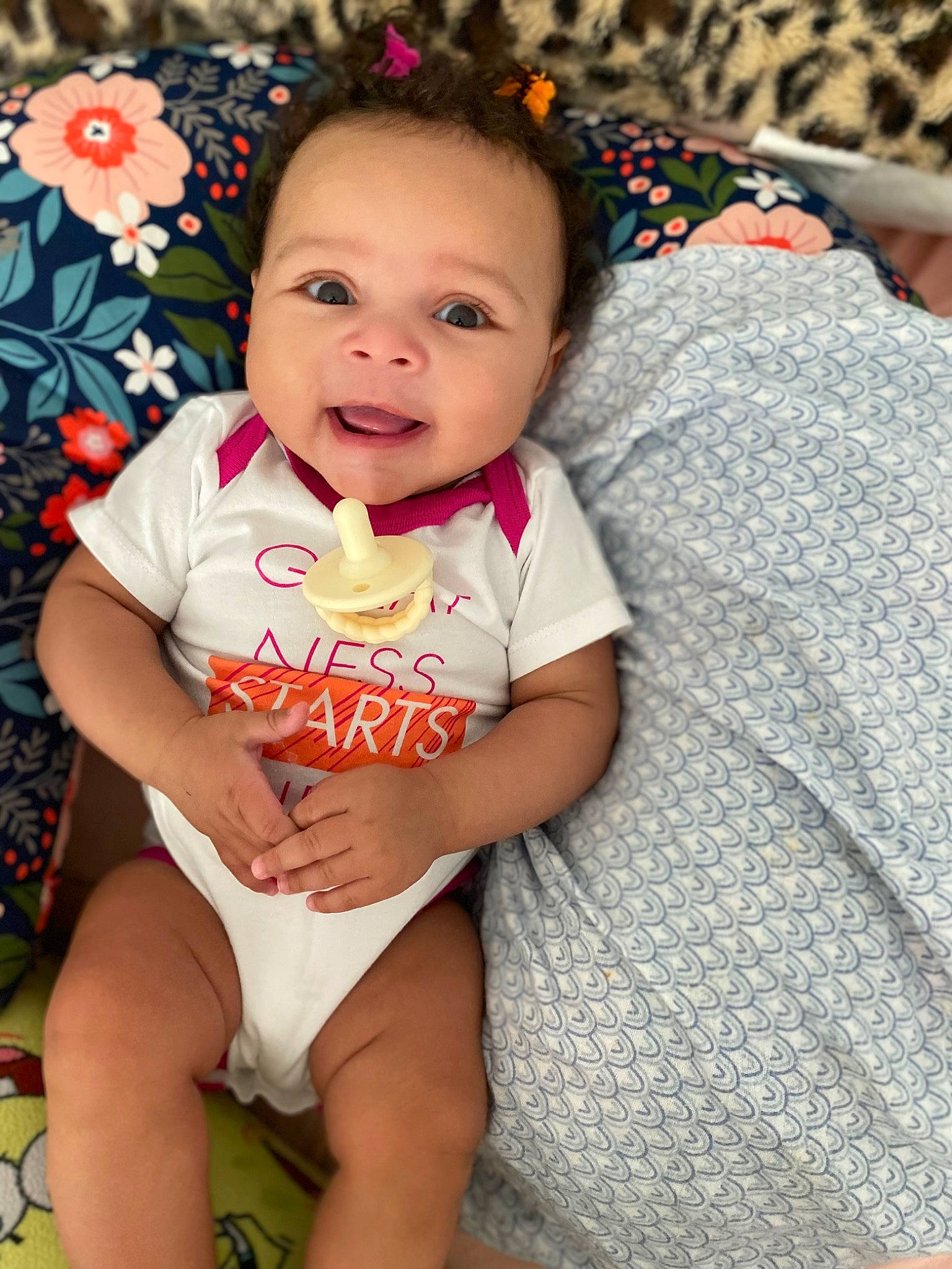 Dream is registered to the contest to win money with this photo: baby, baby_toddler_clothing, cheek, child, eye, face, grass, happy, head, human_leg, iris, lip, pattern, person, plant, skin, sleeve, smile, thigh, toddler