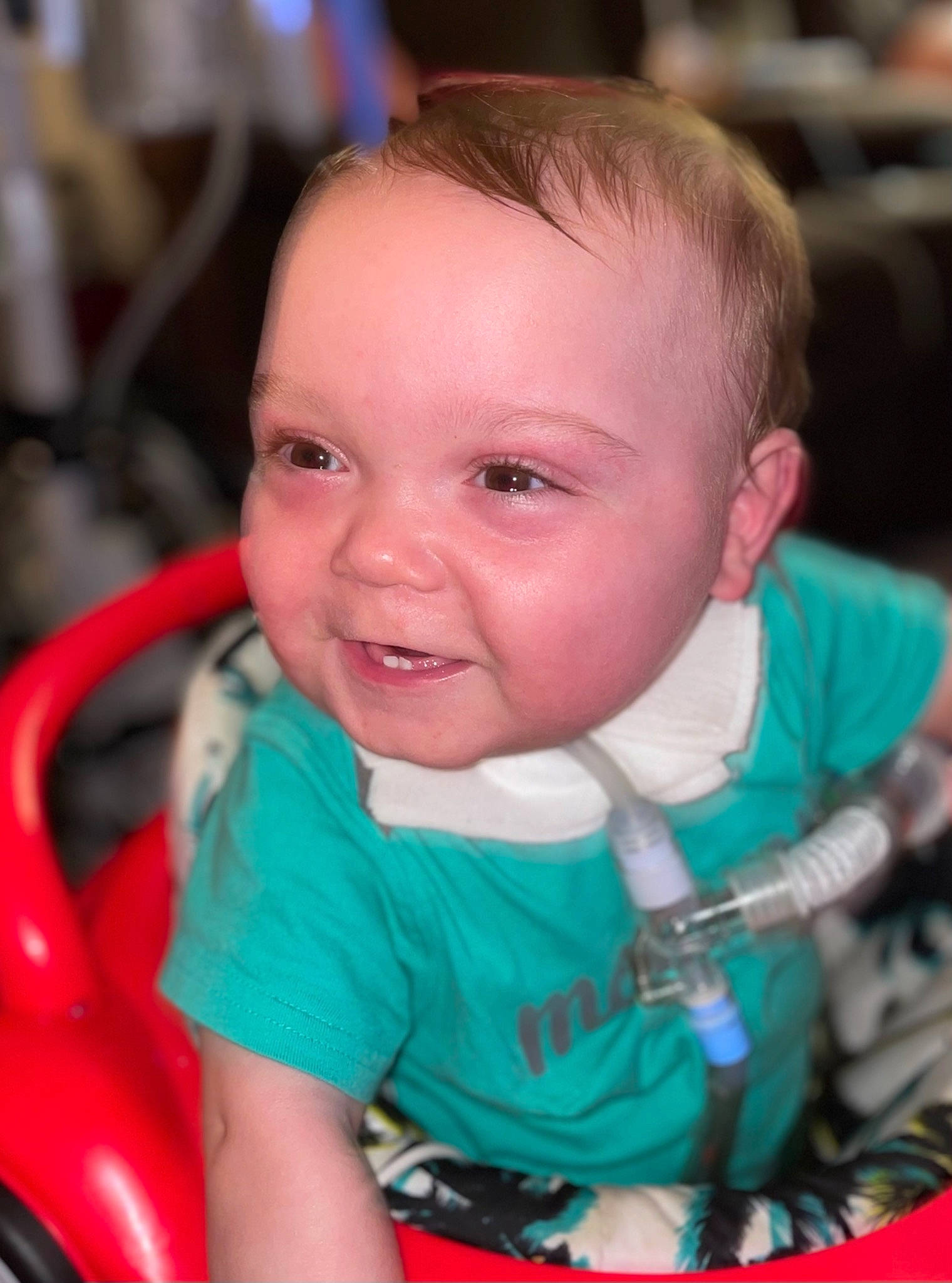 Christian joined the competition — help win amazing prizes! baby, baby_carriage, baby_products, baby_toddler_clothing, cheek, child, event, fun, happy, iris, joy, leisure, person, red, riding_toy, sitting, skin, smile, steering_wheel, tire
