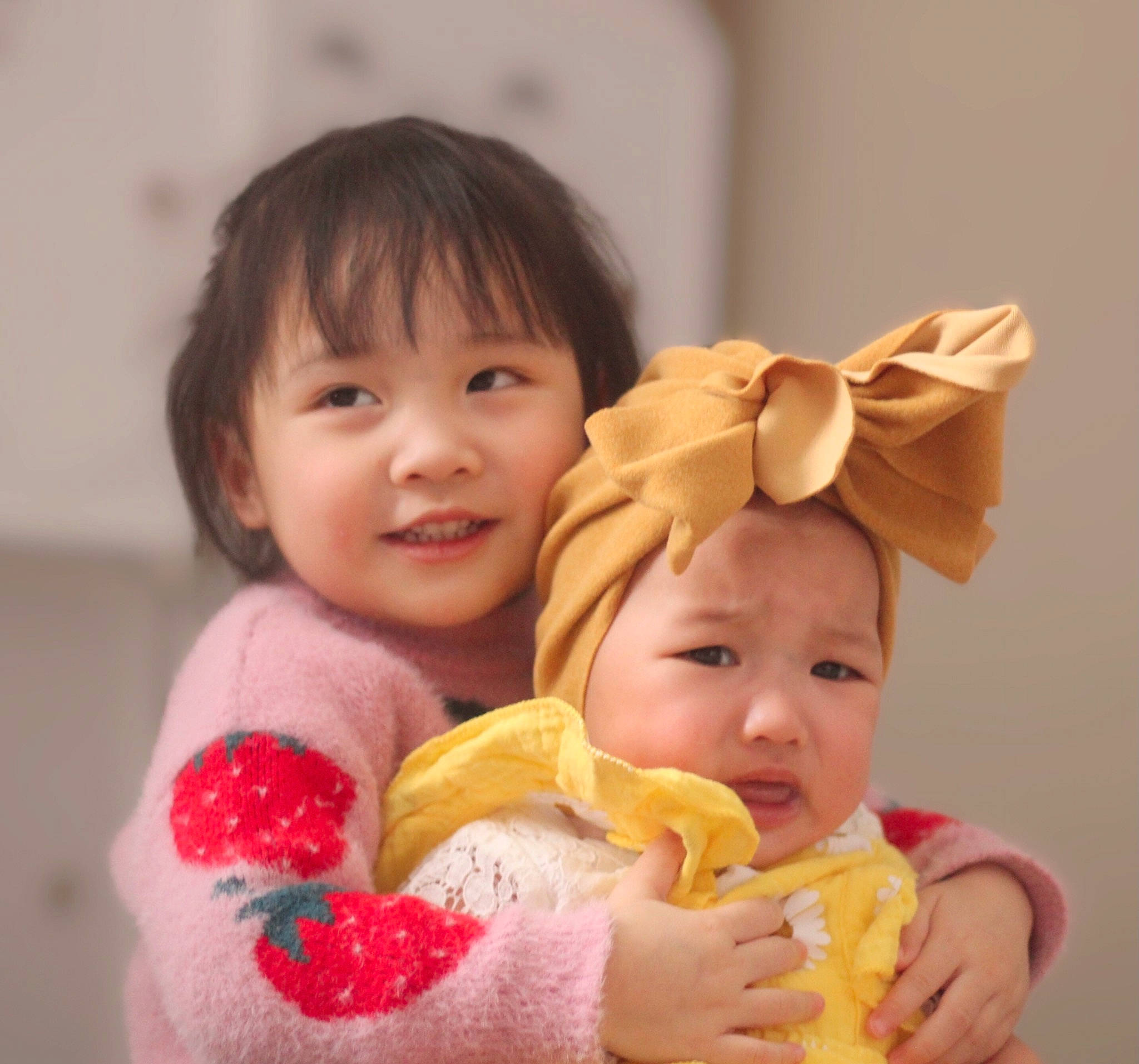 Miracle joined the competition — help win amazing prizes! baby, baby_playing_with_toys, baby_toddler_clothing, cheek, child, face, finger, fun, gesture, happy, headwear, interaction, joy, nose, person, product, sharing, skin, sleeve, smile