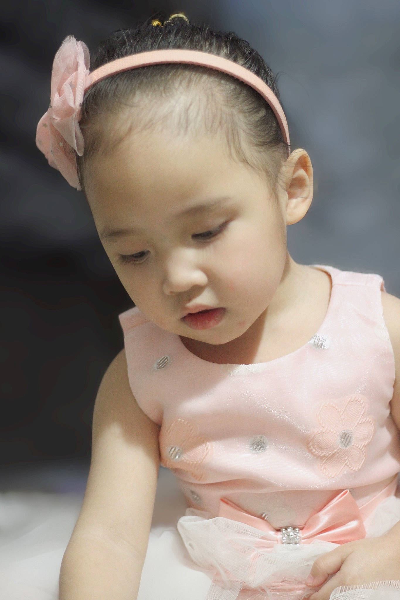 Miracle is registered to the contest to win money with this photo: arm, baby, baby_toddler_clothing, bridal_accessory, cheek, dress, ear, eyelash, flash_photography, hairstyle, happy, head, headband, headgear, headpiece, iris, person, skin, sleeve, toddler