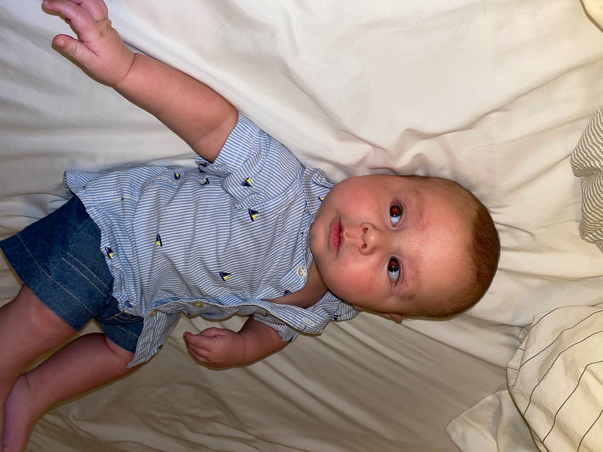 Beckham joined the competition — help win amazing prizes! abdomen, arm, baby, baby_toddler_clothing, chest, child, comfort, elbow, face, finger, head, human_body, linens, mouth, pattern, person, skin, sleeve, stomach, textile