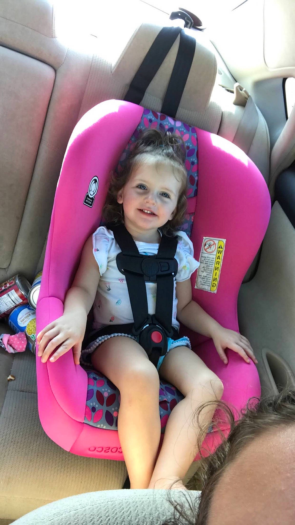 Nova-leigh is registered to the contest to win money with this photo: auto_part, automotive_design, baby_toddler_clothing, car_seat, car_seat_cover, child, comfort, fun, happy, head_restraint, human_leg, joy, knee, leg, leisure, motor_vehicle, person, pink, smile, thigh