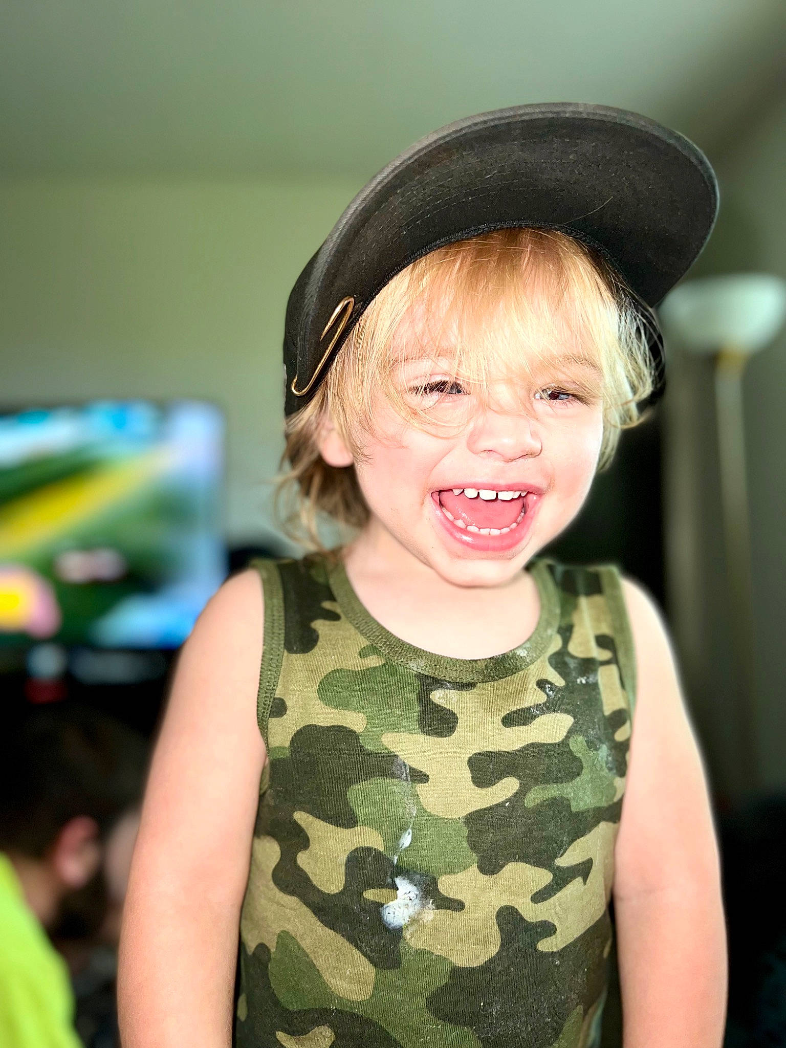 Donavan joined the competition — help win amazing prizes! baby_toddler_clothing, camouflage, cool, eye, eyelash, face, facial_expression, happy, head, human_body, lip, military_camouflage, nose, people, person, pink, skin, sleeve, smile, standing