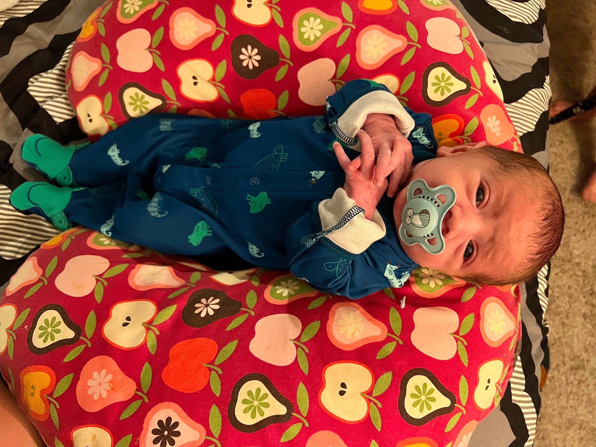 Hutson Kendrick is registered to the contest to win money with this photo: baby, baby_products, baby_sleeping, baby_toddler_clothing, bedding, bedtime, child, comfort, flooring, happy, linens, orange, pattern, person, pink, play, red, room, sleeve, textile