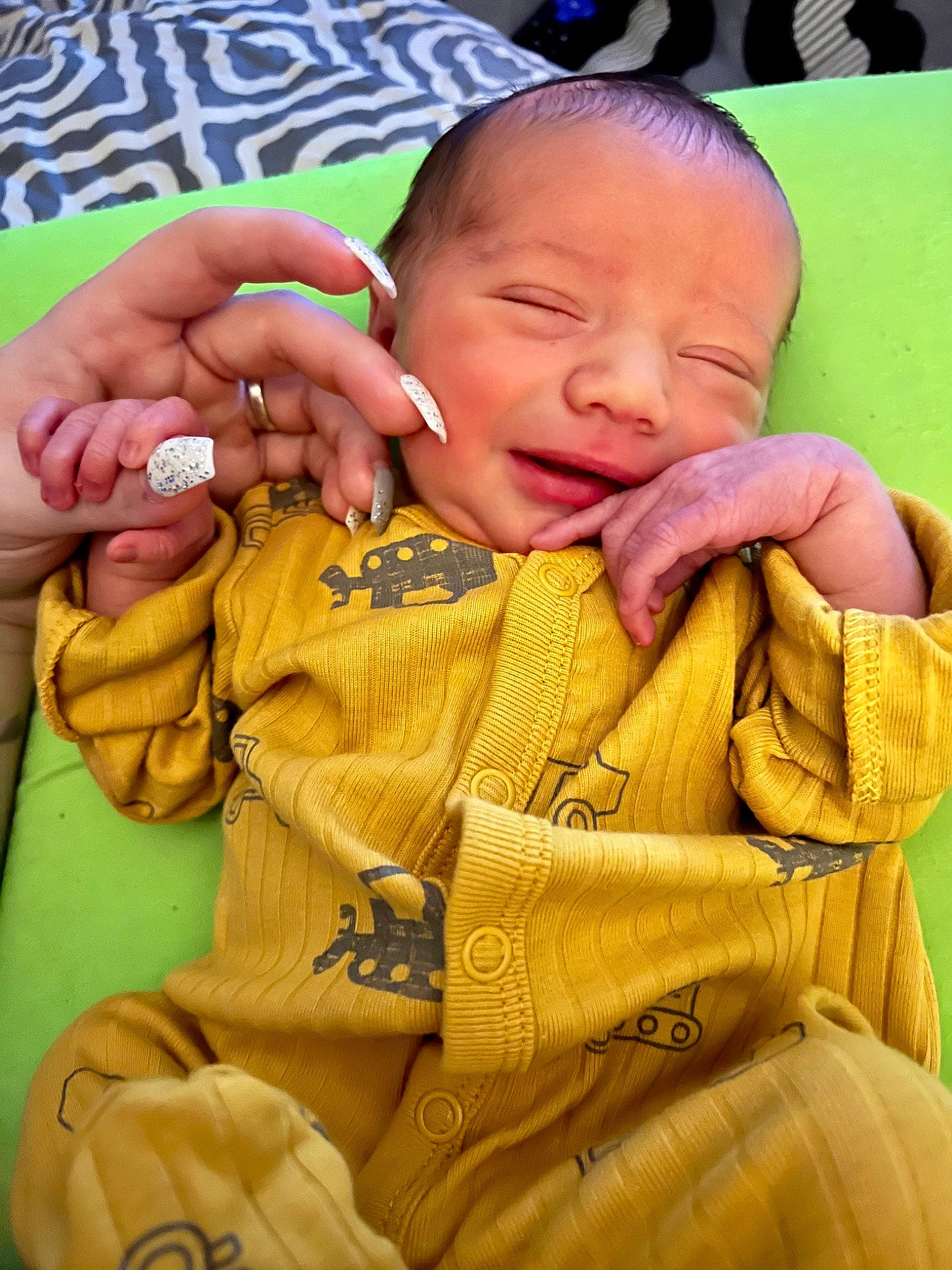 Hutson Kendrick is registered to the contest to win money with this photo: baby, baby_toddler_clothing, cheek, chin, comfort, ear, eye, face, finger, gesture, hand, happy, head, human_body, mouth, nose, person, skin, sleeve, thumb