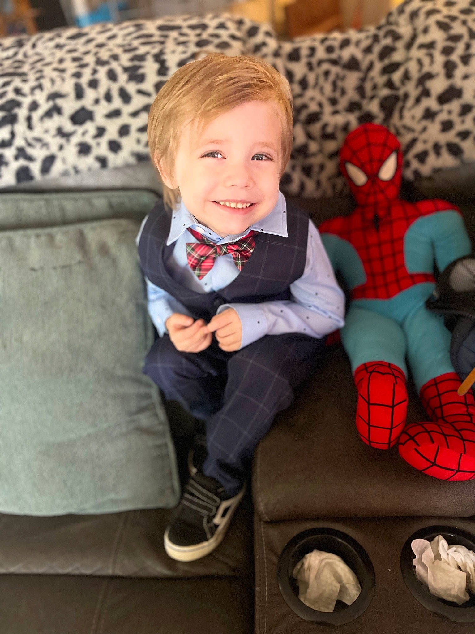 Tristen Kendrick joined the competition — help win amazing prizes! baby, baby_toddler_clothing, chair, couch, footwear, furniture, happy, head, joy, lap, leg, person, plaid, shoe, smile, sneakers, sock, standing, tartan, textile