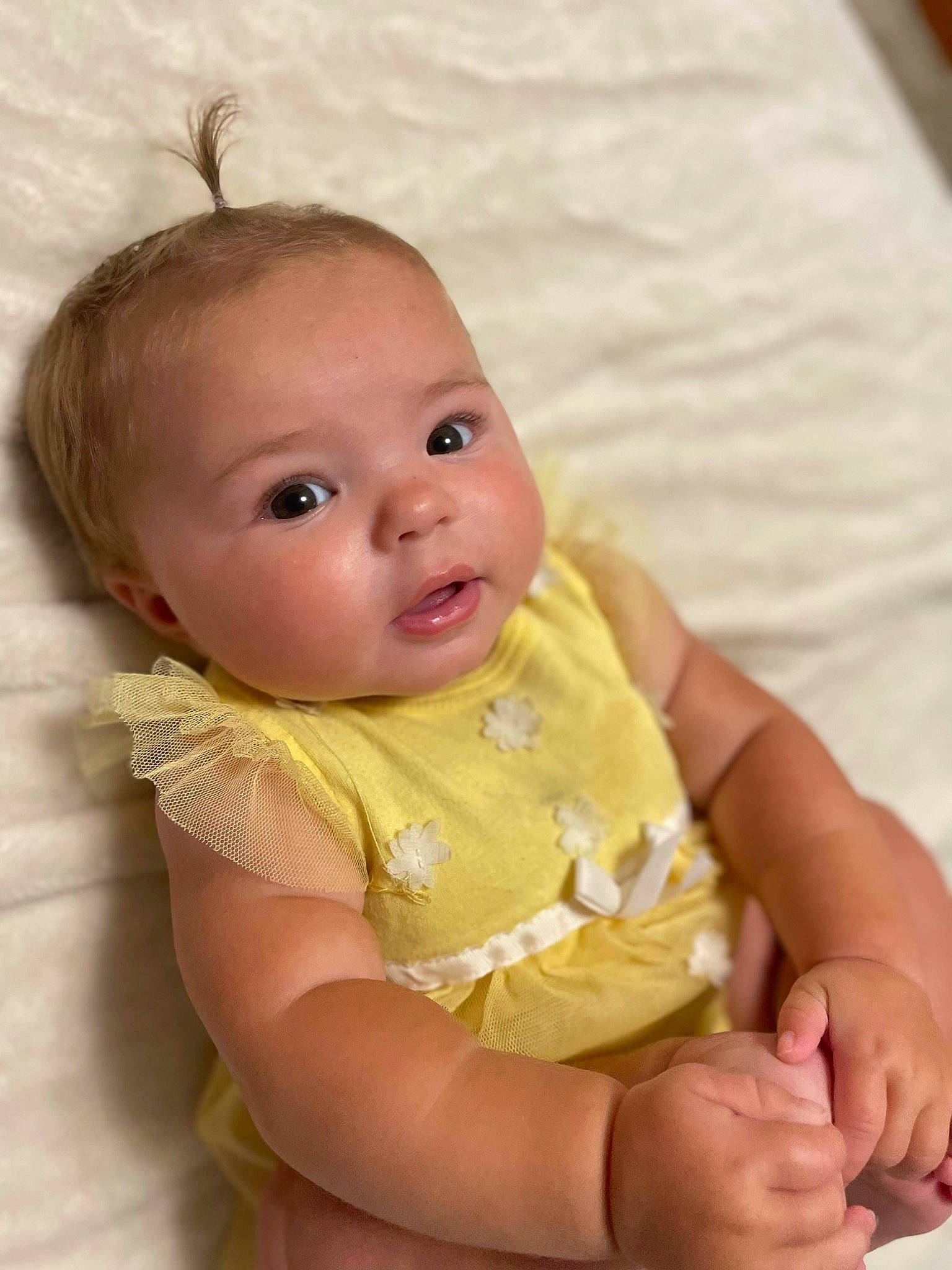 Maleah is registered to the contest to win money with this photo: baby, baby_toddler_clothing, cheek, child, chin, comfort, dress, eye, eyelash, face, happy, head, headgear, iris, lip, person, pink, skin, sleeve, textile