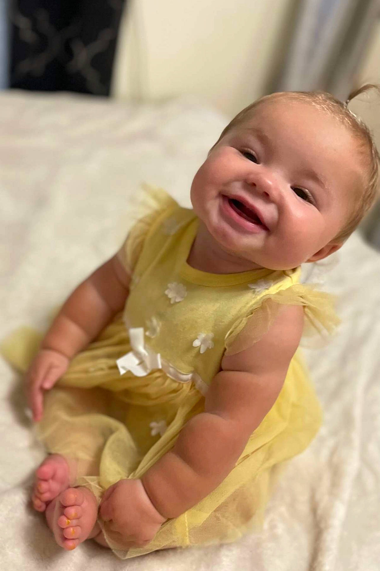 Maleah joined the competition — help win amazing prizes! arm, baby, baby_laughing, baby_toddler_clothing, cheek, child, comfort, dress, eye, happy, human_body, iris, linens, person, pink, sitting, skin, sleeve, smile, textile