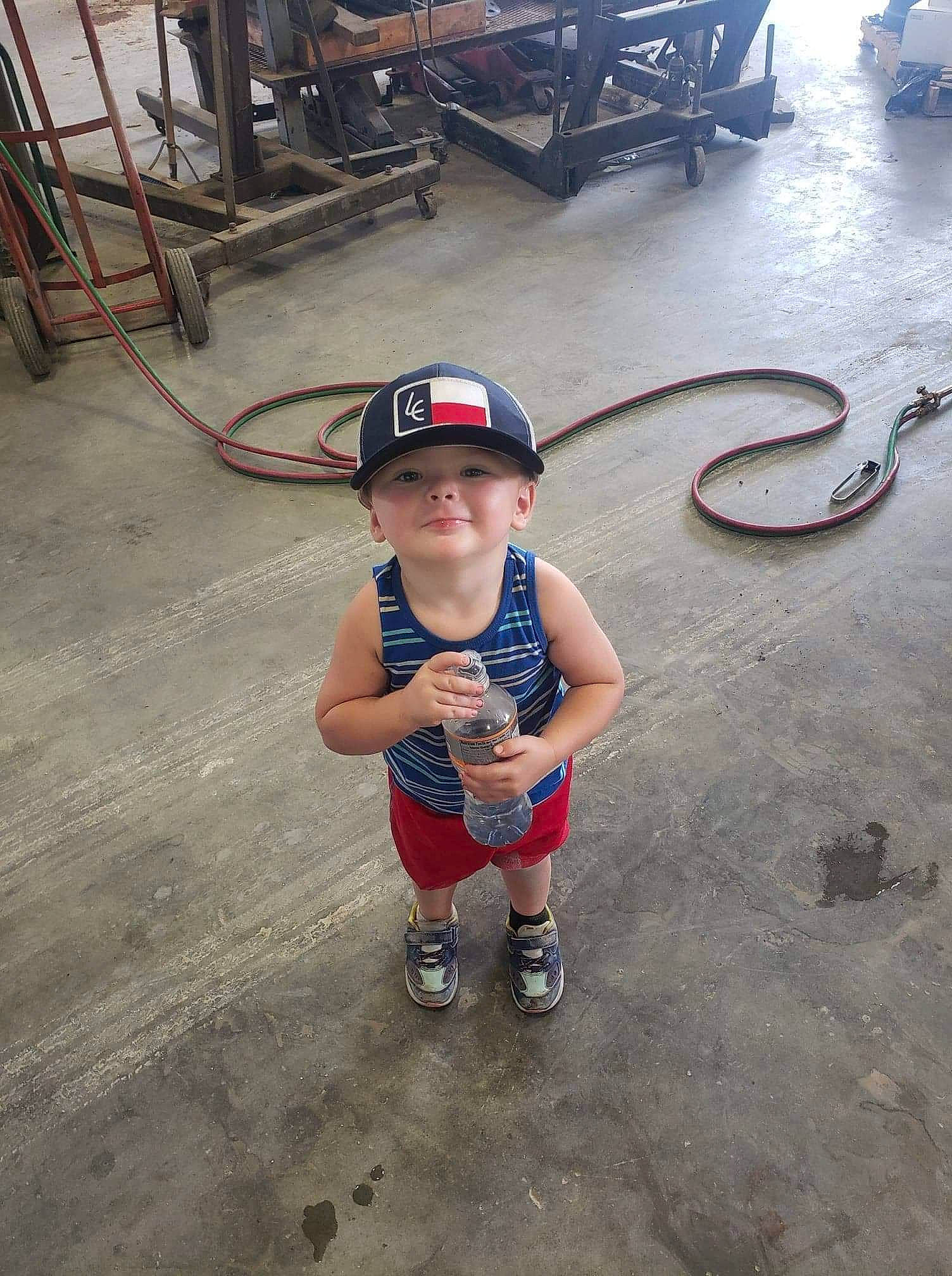 Terrell Jr joined the competition — help win amazing prizes! asphalt, automotive_tire, child, concrete, eyewear, flooring, fun, gas, hat, headwear, human_leg, leisure, metal, person, recreation, road_surface, shorts, smile, soil, t_shirt