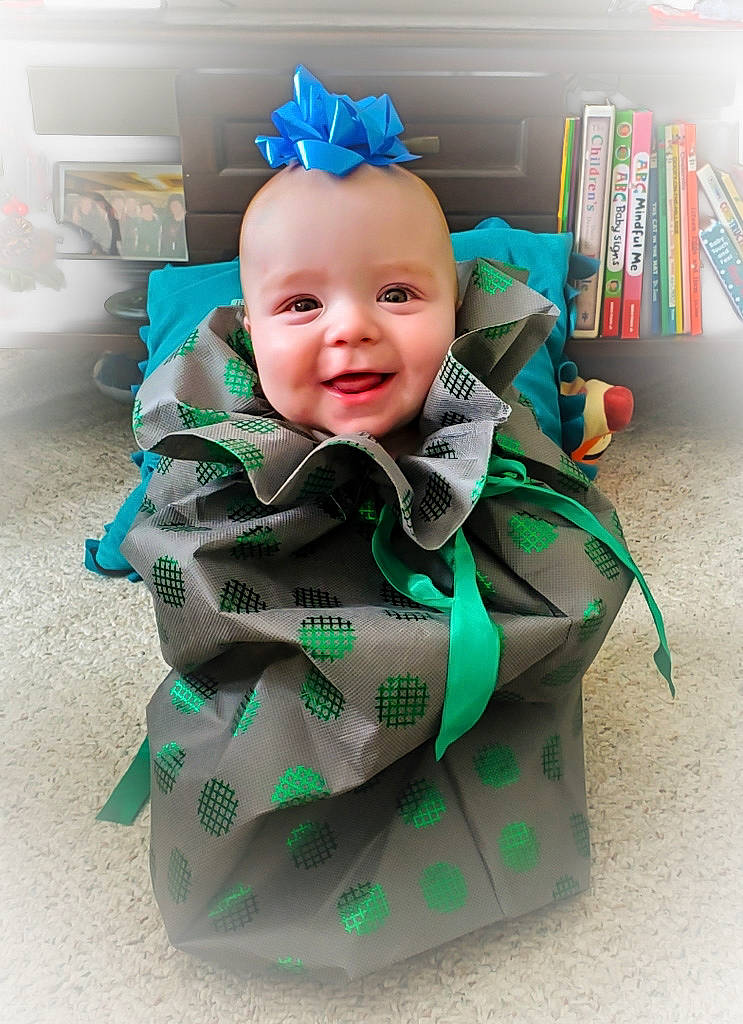 Owen joined the competition — help win amazing prizes! baby, baby_products, baby_toddler_clothing, baby_toys, bookcase, child, eye, fashion_accessory, fictional_character, flooring, fun, happy, head, pattern, person, room, sitting, sleeve, smile, textile