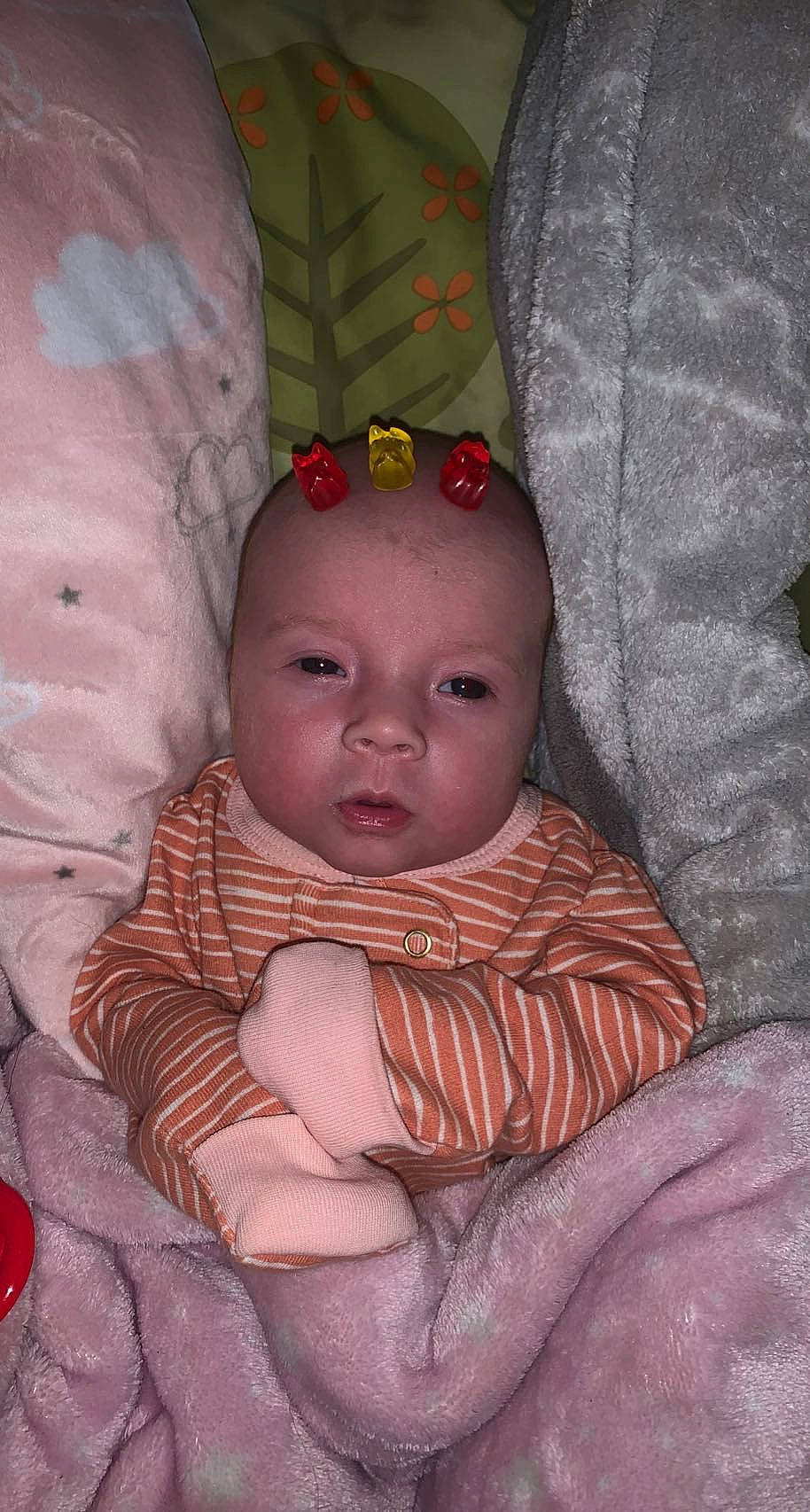 Alora joined the competition — help win amazing prizes! baby, baby_toddler_clothing, cheek, child, chin, comfort, eye, finger, human_body, iris, linens, lip, mouth, nose, person, pink, skin, sleeve, textile, toddler