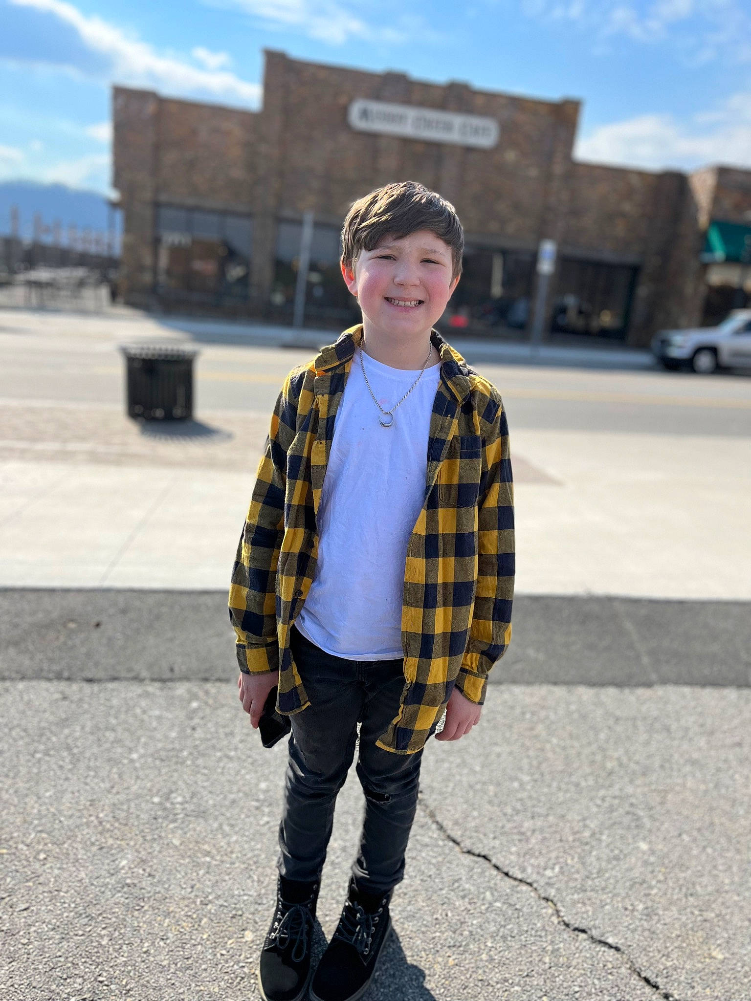 Cadence joined the competition — help win amazing prizes! asphalt, blazer, clothing, cloud, collar, dress_shirt, eyewear, headgear, joy, neck, person, plaid, road_surface, sky, sleeve, smile, street_fashion, t_shirt, tartan, tie