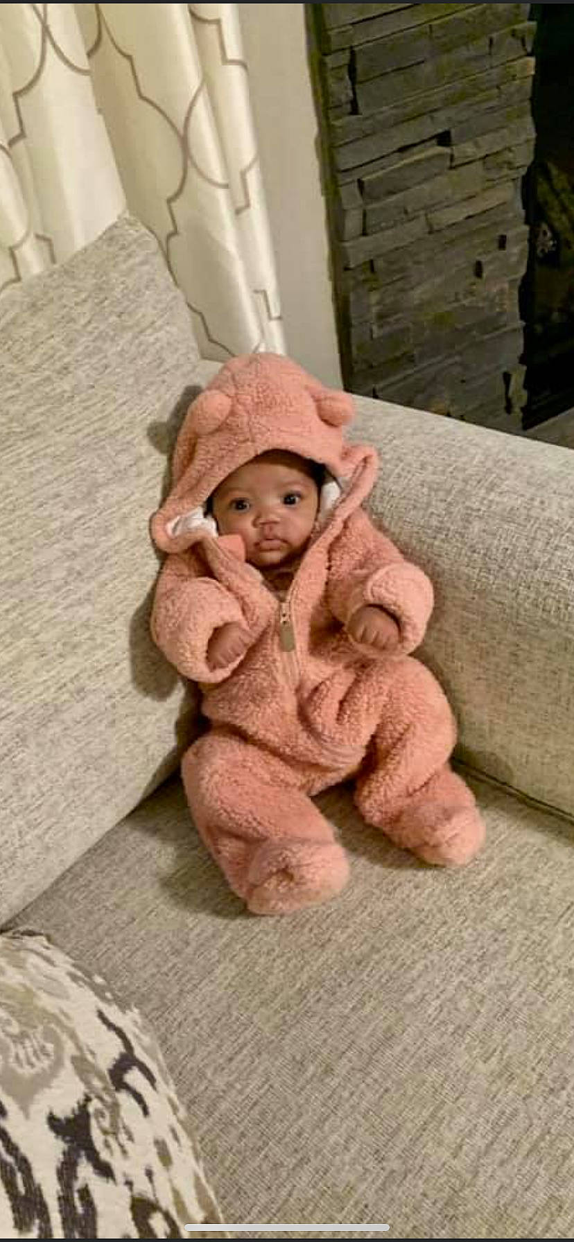 Chosen is registered to the contest to win money with this photo: baby, beanie, beige, cap, child, fur, headgear, outerwear, person, pink, teddy_bear, textile, toddler, toy
