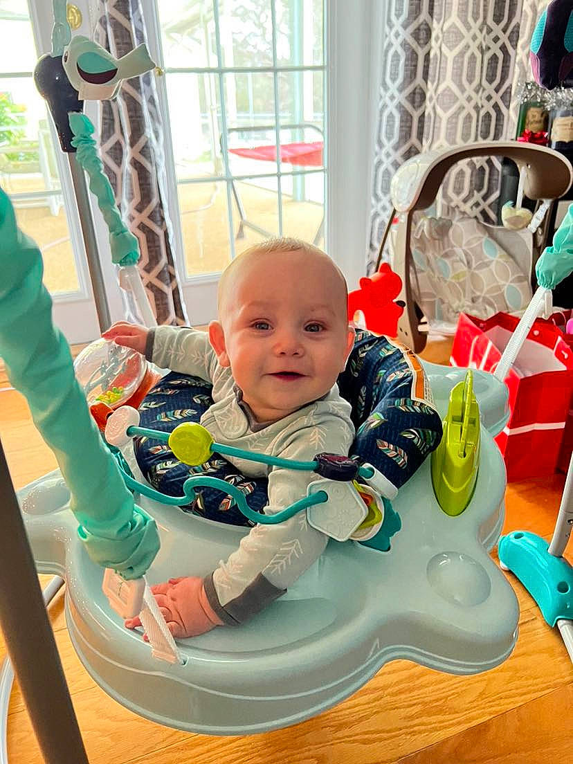 Ezekiel joined the competition — help win amazing prizes! baby, baby_playing_with_toys, baby_products, baby_safety, baby_toddler_clothing, cheek, child, comfort, event, fun, green, happy, joy, leisure, person, play, product, room, sitting, skin