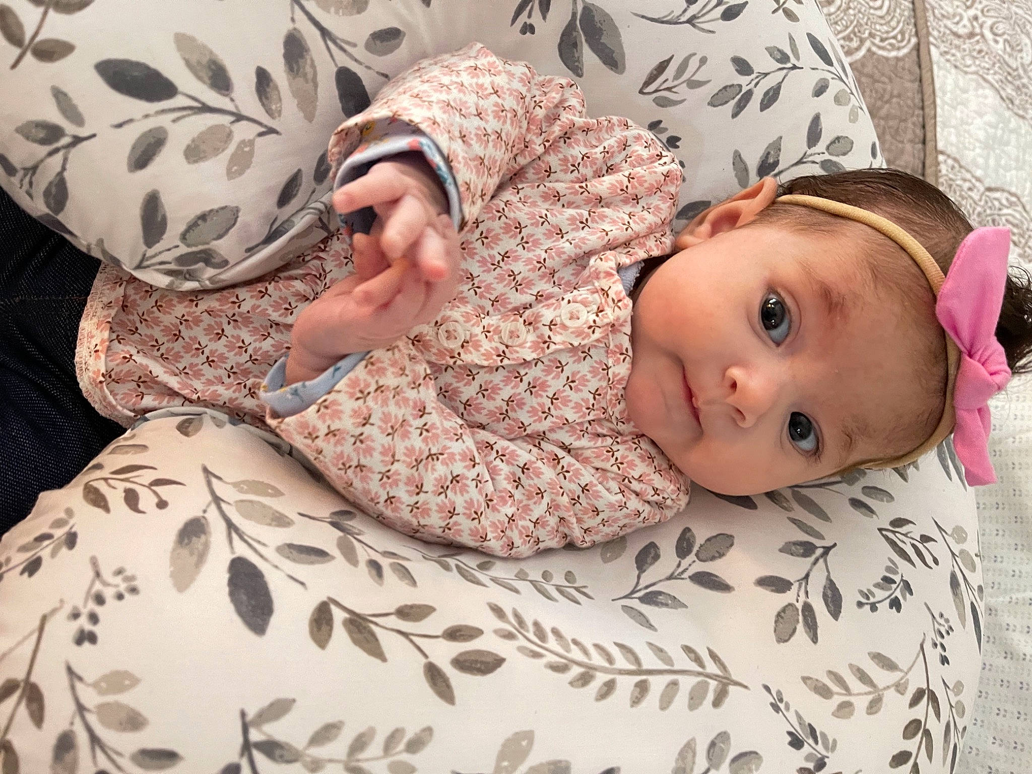 Jaylani joined the competition — help win amazing prizes! baby, baby_products, baby_toddler_clothing, bedding, cheek, child, comfort, eye, fashion_accessory, flooring, happy, linens, pattern, person, pink, portrait_photography, room, sitting, skin, sleeve