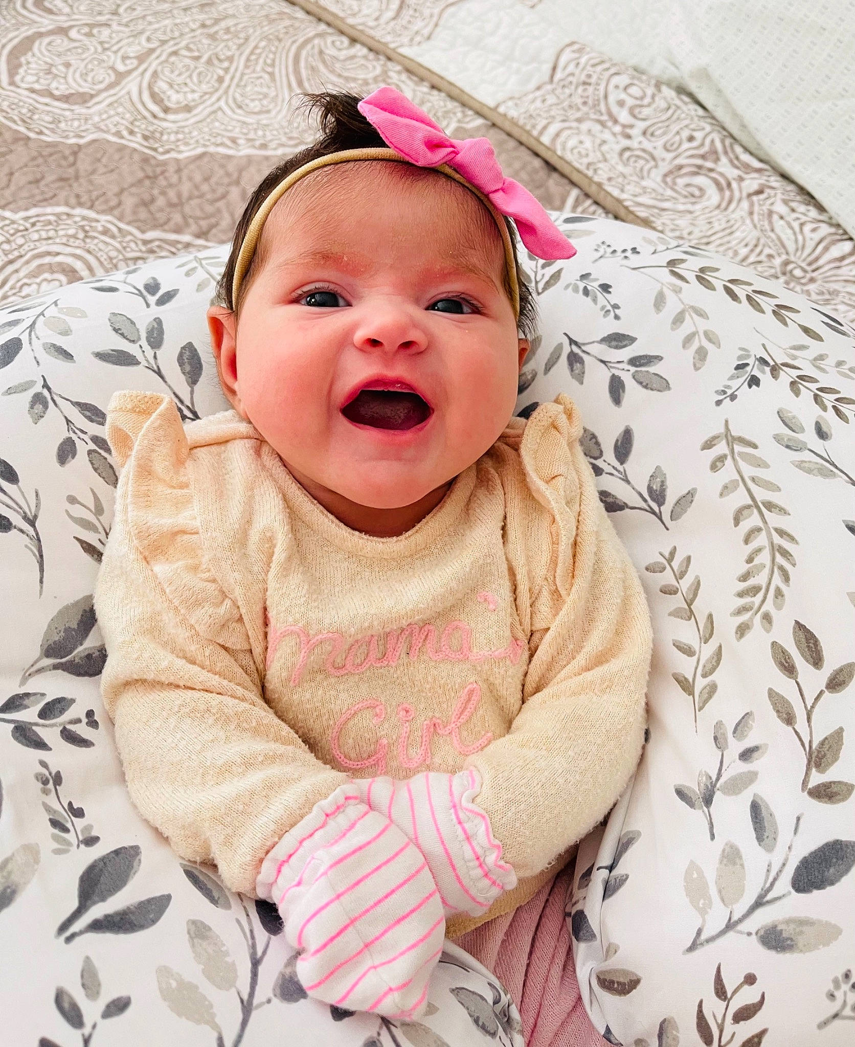 Jaylani is registered to the contest to win money with this photo: baby, baby_laughing, baby_toddler_clothing, bedding, cheek, child, comfort, fun, happy, laugh, linens, lip, magenta, pattern, person, pink, room, shout, sleeve, smile
