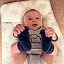 George joined the competition — help win amazing prizes! baby, infant, smiling, onesie, elephant_print, socks, blue_socks, cushioned_mat, elephant_pattern, carpet, floor, happy, child, cute, indoor, portrait, baby_clothing, playful, lying_down, hand