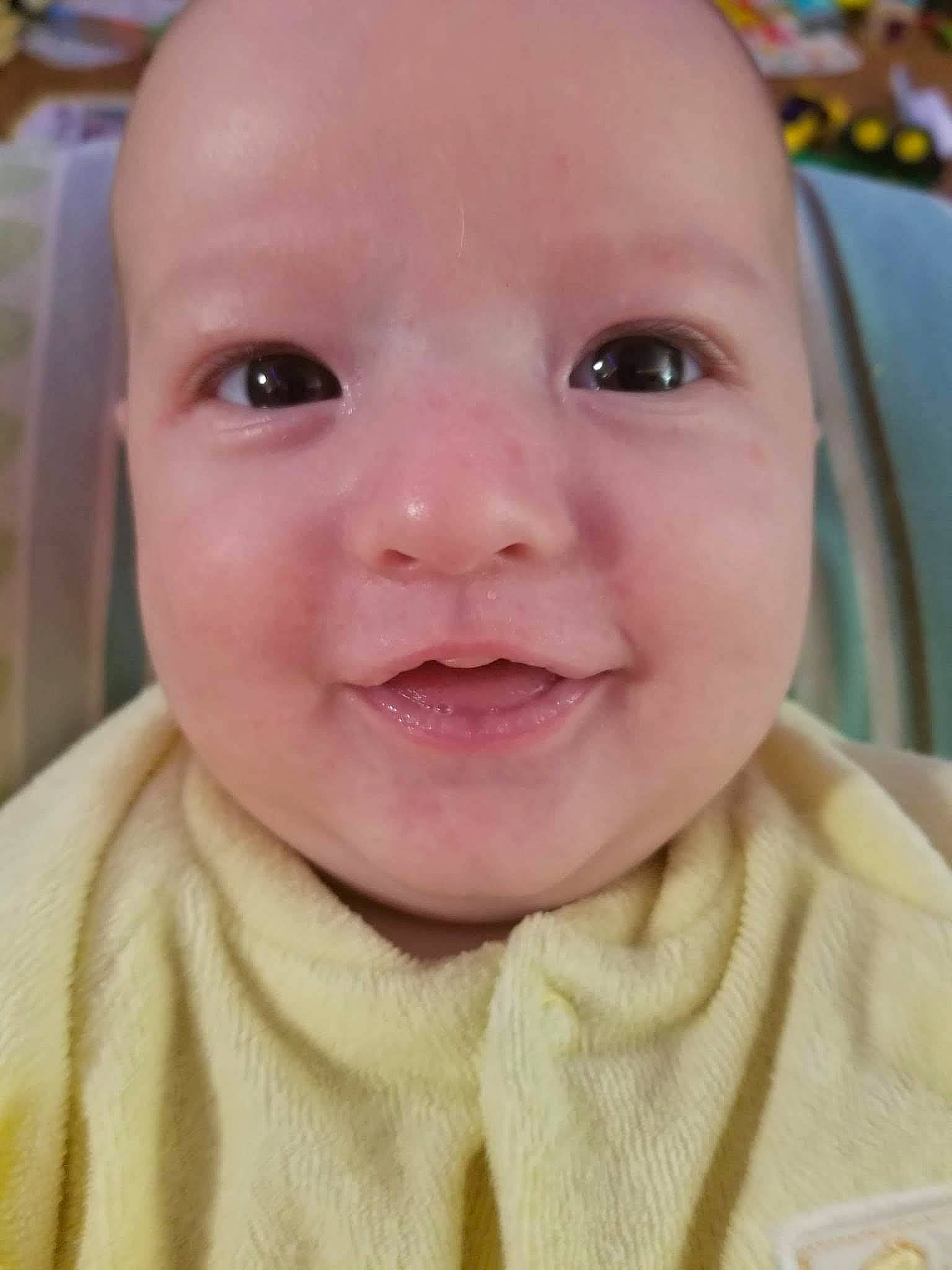 Gryffin joined the competition — help win amazing prizes! baby, baby_toddler_clothing, cheek, child, chin, close_up, collar, ear, eye, eyebrow, eyelash, facial_expression, iris, lip, nose, person, pink, skin, sleeve, smile