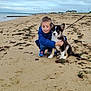 Lowen Duval a rejoint le concours — aidez-le/la à gagner de superbes lots ! child, boy, puppy, dog, beach, sand, sea, sky, clouds, blue_jacket, sneakers, leash, hug, smile, outdoor, coast, portrait, pet, playful, vacation