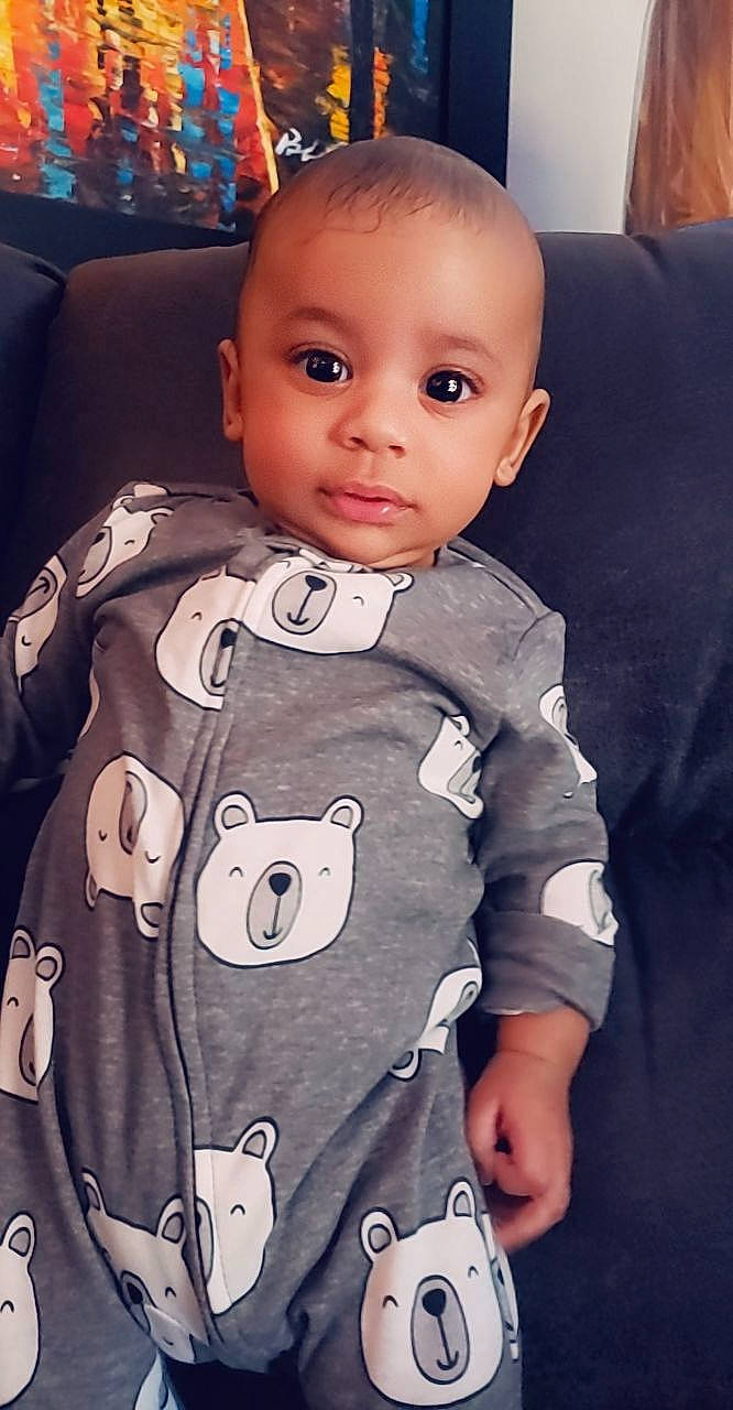 Cashton is registered to the contest to win money with this photo: baby, baby_products, cheek, child, cool, ear, eye, face, facial_expression, forehead, head, nose, outerwear, person, play, product, skin, sleeve, smile, t_shirt