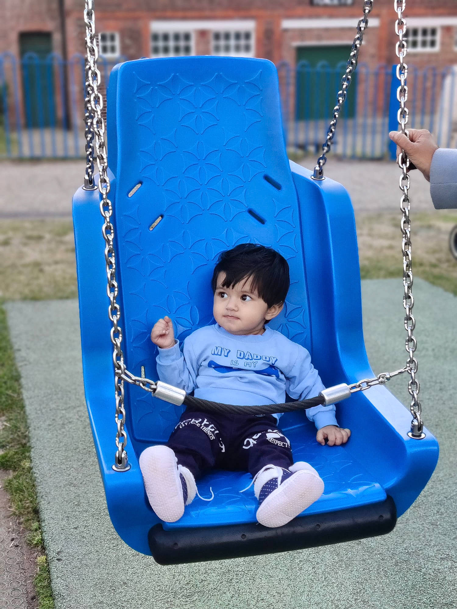 Alisha joined the competition — help win amazing prizes! azure, baby_toddler_clothing, blue, child, city, electric_blue, eye, fun, grass, green, leisure, outdoor_play_equipment, person, photograph, playground, public_space, recreation, sitting, swing, toddler