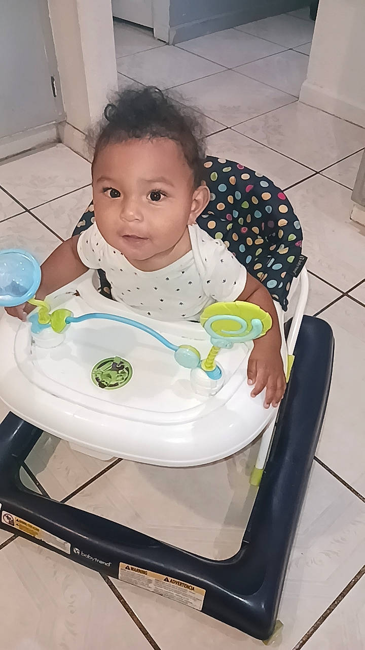 Amari joined the competition — help win amazing prizes! baby, baby_products, baby_safety, baby_toddler_clothing, bathing, bib, chair, child, circle, comfort, flooring, happy, iris, person, plastic, play, sitting, toddler