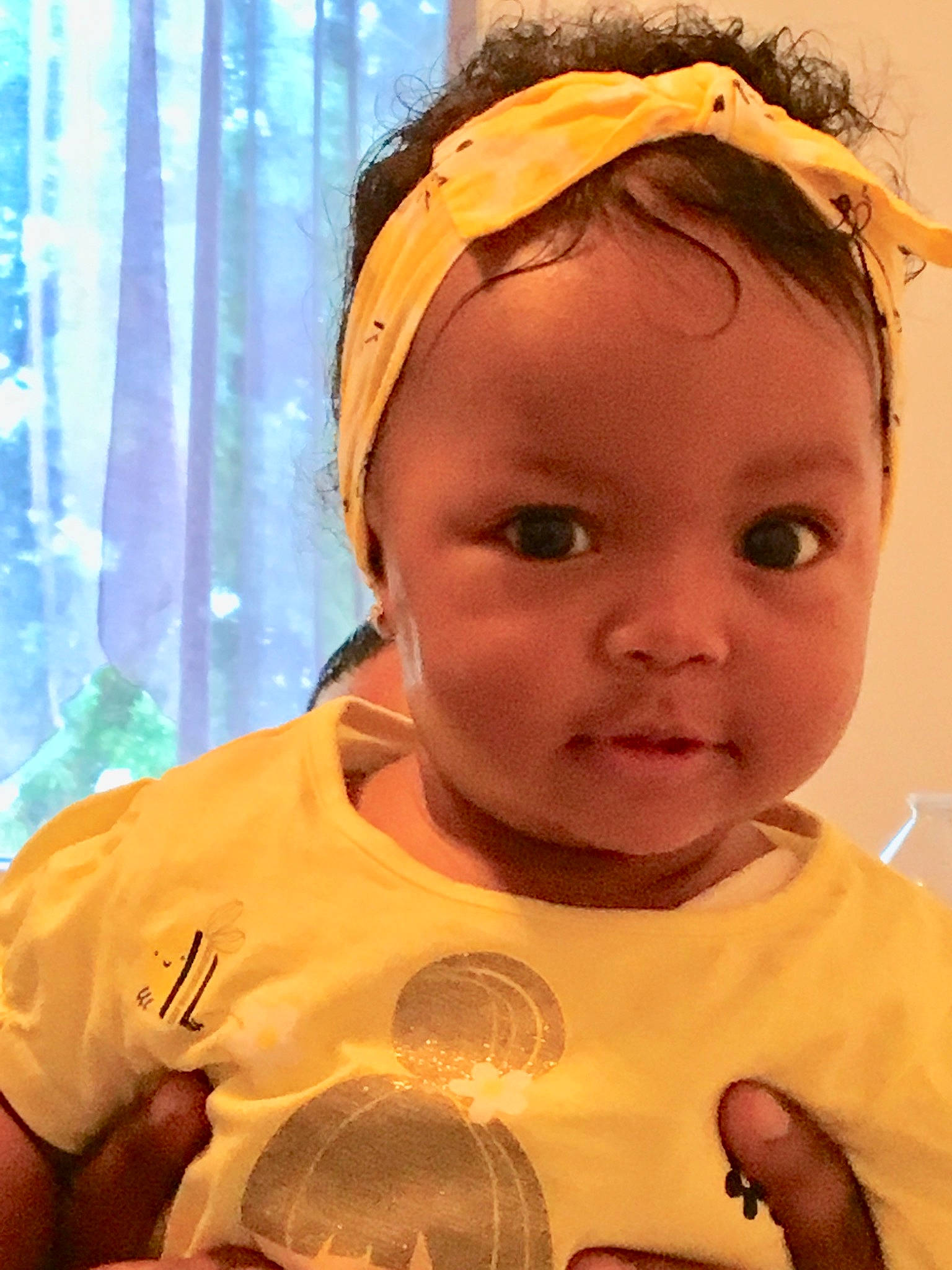 Nayah participe au concours pour gagner de l'argent avec cette photo : baby, cheek, child, ear, face, fashion_accessory, forehead, hair_accessory, happy, head, headband, headgear, headpiece, nose, person, skin, smile, toddler, yellow
