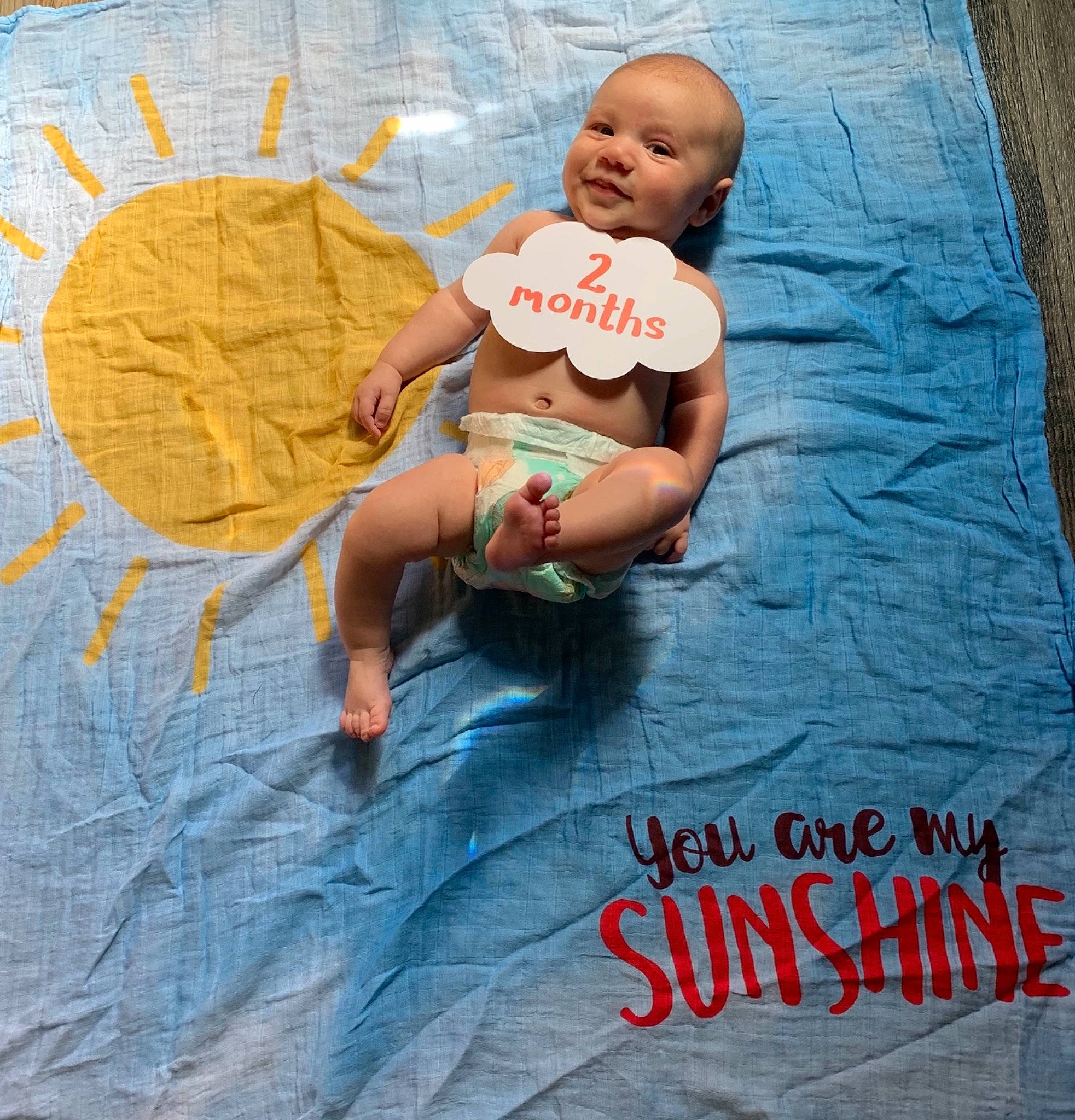 Kieran joined the competition — help win amazing prizes! abdomen, baby, chest, child, eye, flooring, fun, happy, human, human_body, human_leg, illustration, leisure, linens, pattern, person, photo_caption, sitting, textile, thigh