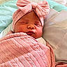 Kylie joined the competition — help win amazing prizes! newborn, baby, sleeping, infant, portrait, face, hospital, bed, blanket, pink, bow, headband, swaddled, peaceful, indoors, close_up, child, soft, resting, photography