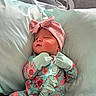 newborn, baby, infant, sleeping, face, portrait, hospital, bassinet, blanket, pillow, floral, outfit, pink_bow, mittens, mint_green, swaddled, cozy, indoors, bed, photography
