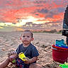 baby, child, toddler, beach, sand, sunset, outdoor, portrait, sitting, sand_toys, bucket, shovel, beach_chair, play, summer, sky, clouds, colorful, family, photography
