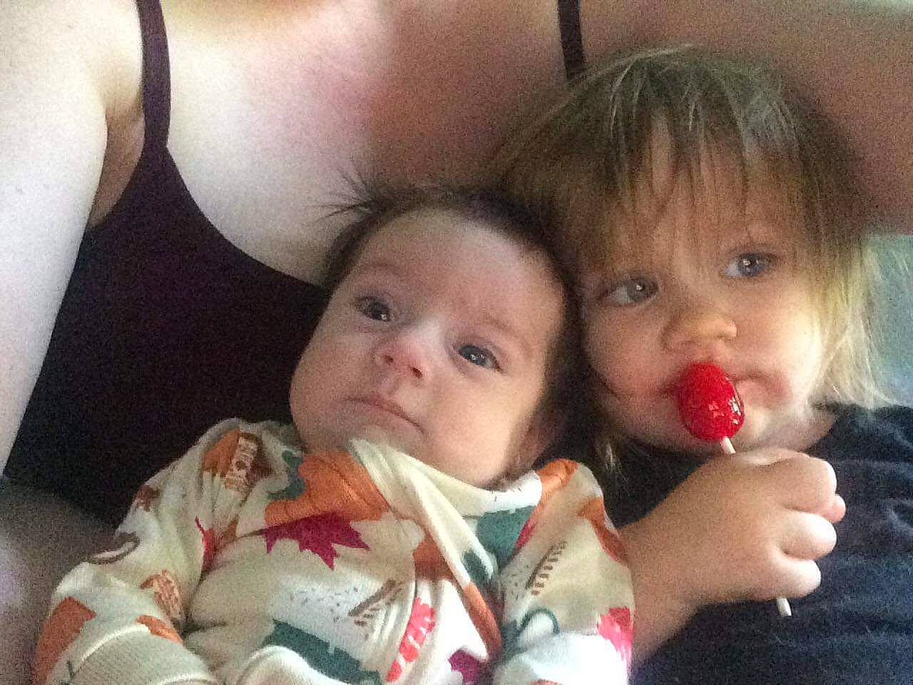 Olivia is registered to the contest to win money with this photo: baby, cheek, child, comfort, facial_expression, finger, fun, gesture, hair, hairstyle, happy, iris, lip, mouth, nose, person, sitting, skin, thumb, toddler