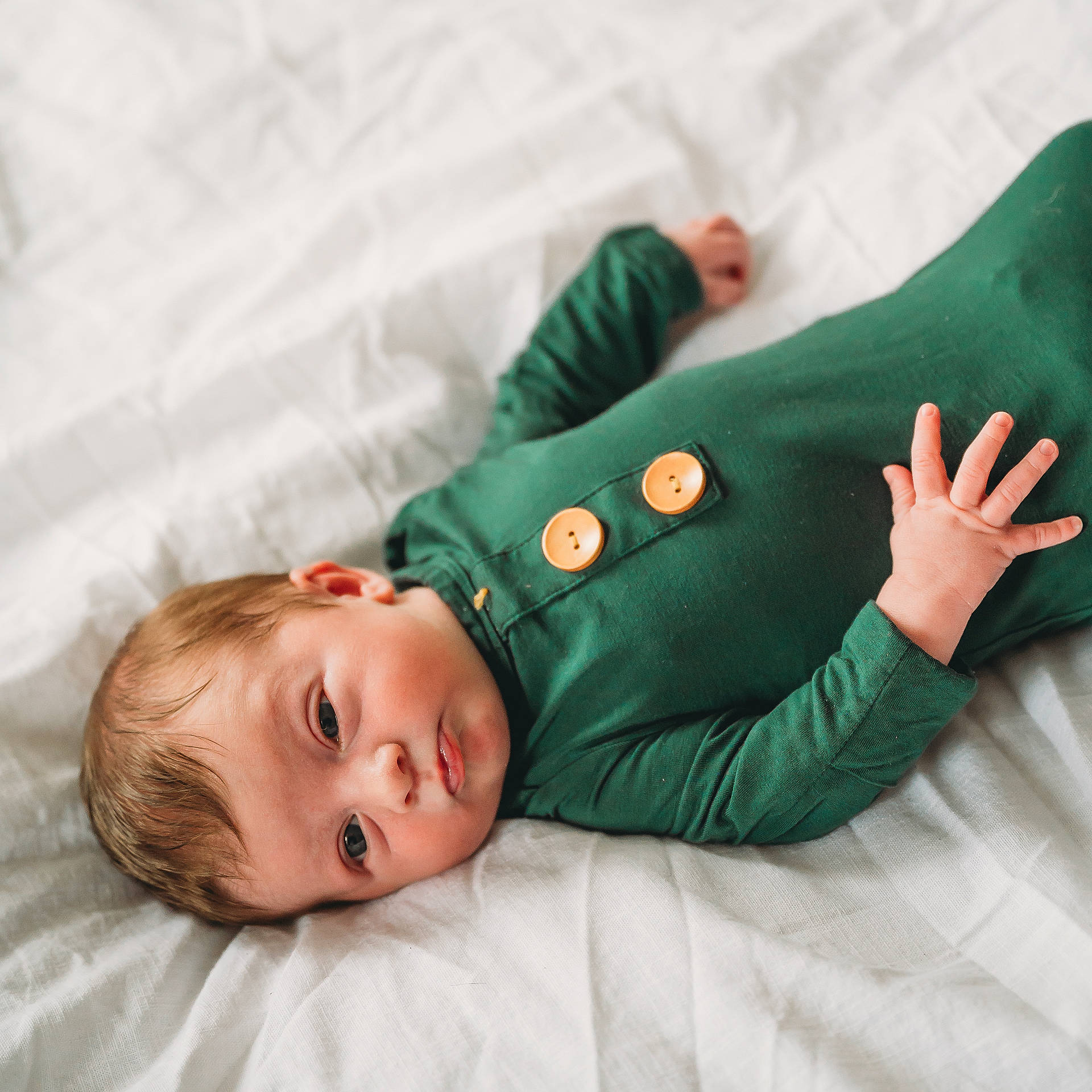 Mason joined the competition — help win amazing prizes! applique, baby, bed, blanket, bodypart, clothing, face, finger, furniture, hand, happy, head, longsleeve, newborn, pattern, person, photography, portrait, sleeve, smile