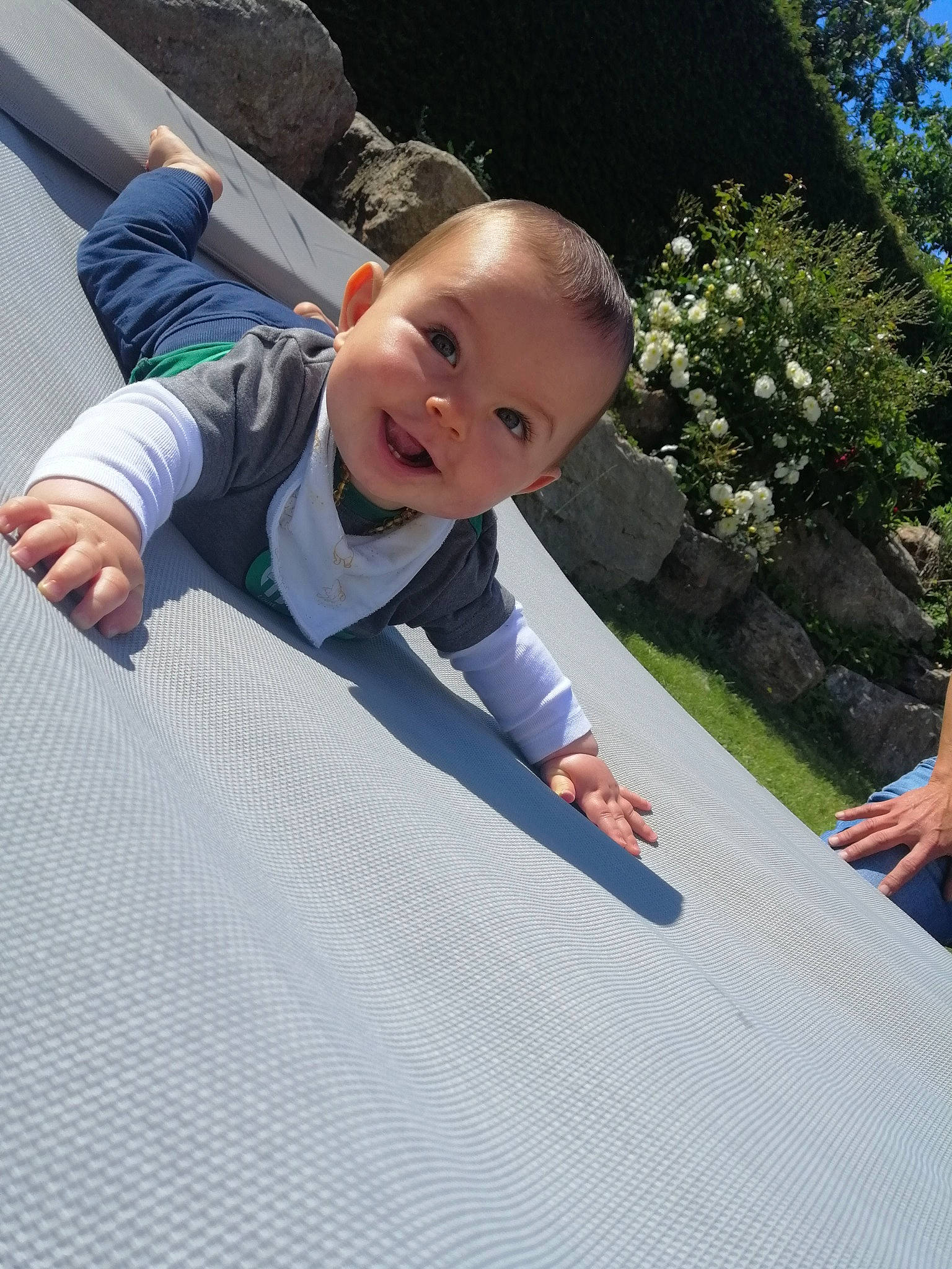 Damien participe au concours pour gagner de l'argent avec cette photo : asphalt, baby, child, electric_blue, flooring, fun, grass, happy, joint, joy, leisure, people_in_nature, person, plant, play, recreation, road_surface, sitting, smile, toddler