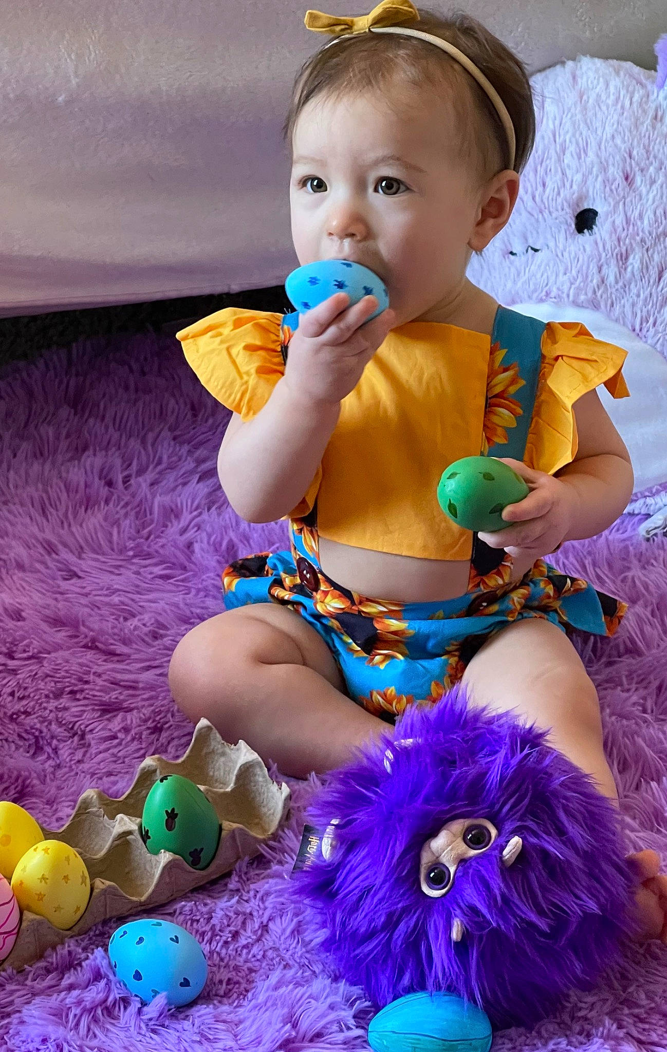 Sophia is registered to the contest to win money with this photo: baby, baby_playing_with_toys, baby_toddler_clothing, blue, child, face, fun, grass, green, happy, head, person, photograph, purple, skin, snapshot, summer, textile, thigh, toddler