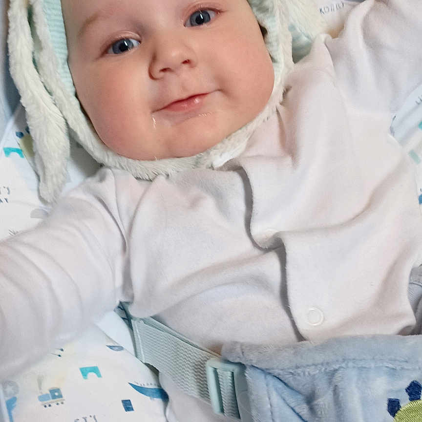 Noah joined the competition — help win amazing prizes! baby, bed, blanket, bonnet, cap, clothing, costume, cushion, face, furniture, hat, head, homedecor, hood, hoodie, knitwear, newborn, person, photography, portrait