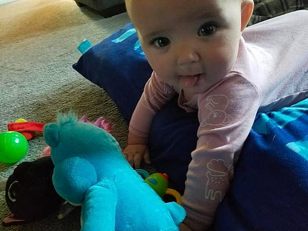 Emma joined the competition — help win amazing prizes! azure, baby, baby_toddler_clothing, baby_toys, balloon, beauty, child, finger, fun, gesture, happy, mammal, person, photograph, snapshot, textile, thumb, toddler, toy, tummy_time