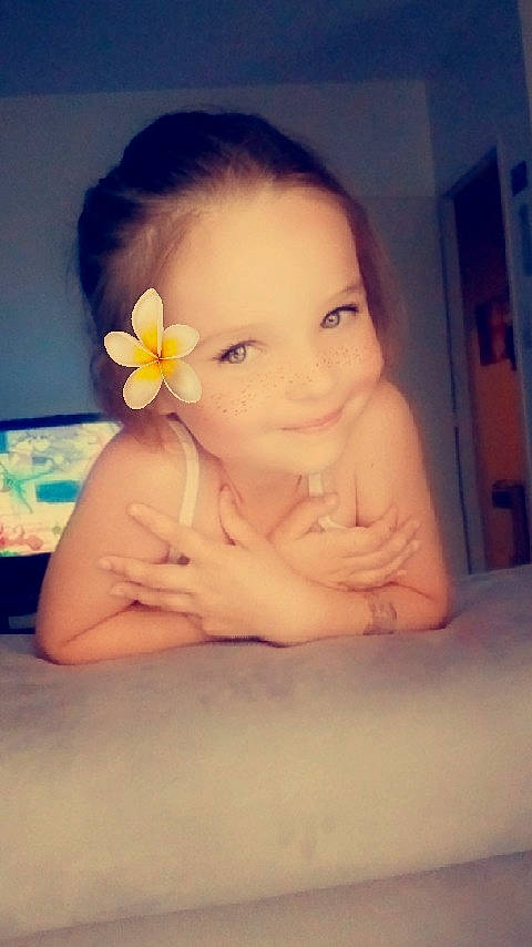 Linaya participe au concours pour gagner de l'argent avec cette photo : baby, bathing, beauty, cheek, child, ear, eye, face, flower, forehead, head, joy, nose, person, photography, plant, skin, smile, toddler, yellow