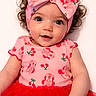 baby, child, infant, smiling, face, headband, bow, curly_hair, pink_clothing, red_tutu, cute, portrait, happy, baby_girl, toddler, fashion, studio, closeup, person, background_white