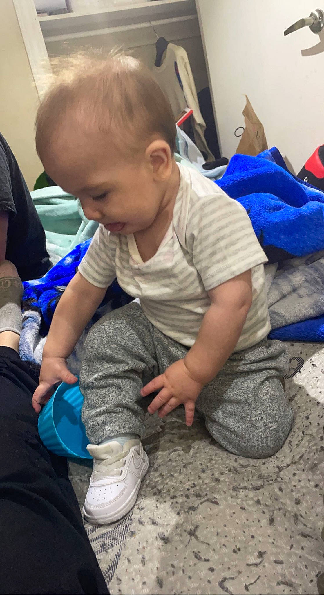 Noah is registered to the contest to win money with this photo: baby, baby_toddler_clothing, child, comfort, crawling, electric_blue, flooring, foot, fun, grass, hand, human_leg, leg, person, play, sitting, sock, soil, toddler, vacation