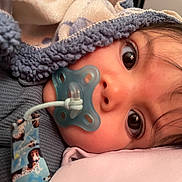 Cartier is registered to the contest to win money with this photo: baby, pacifier, blanket, closeup, face, infant, child, sleeping, pillow, cozy, cute, indoors, soft, comfort, warm, expression, head, skin, hair, resting