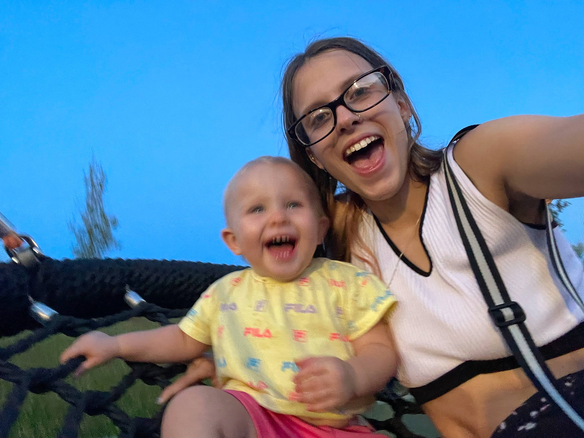 Kallie joined the competition — help win amazing prizes! baby, event, facial_expression, flash_photography, fun, gesture, happy, human, leisure, people_in_nature, person, recreation, shorts, sitting, sky, smile, summer, t_shirt, toddler, travel