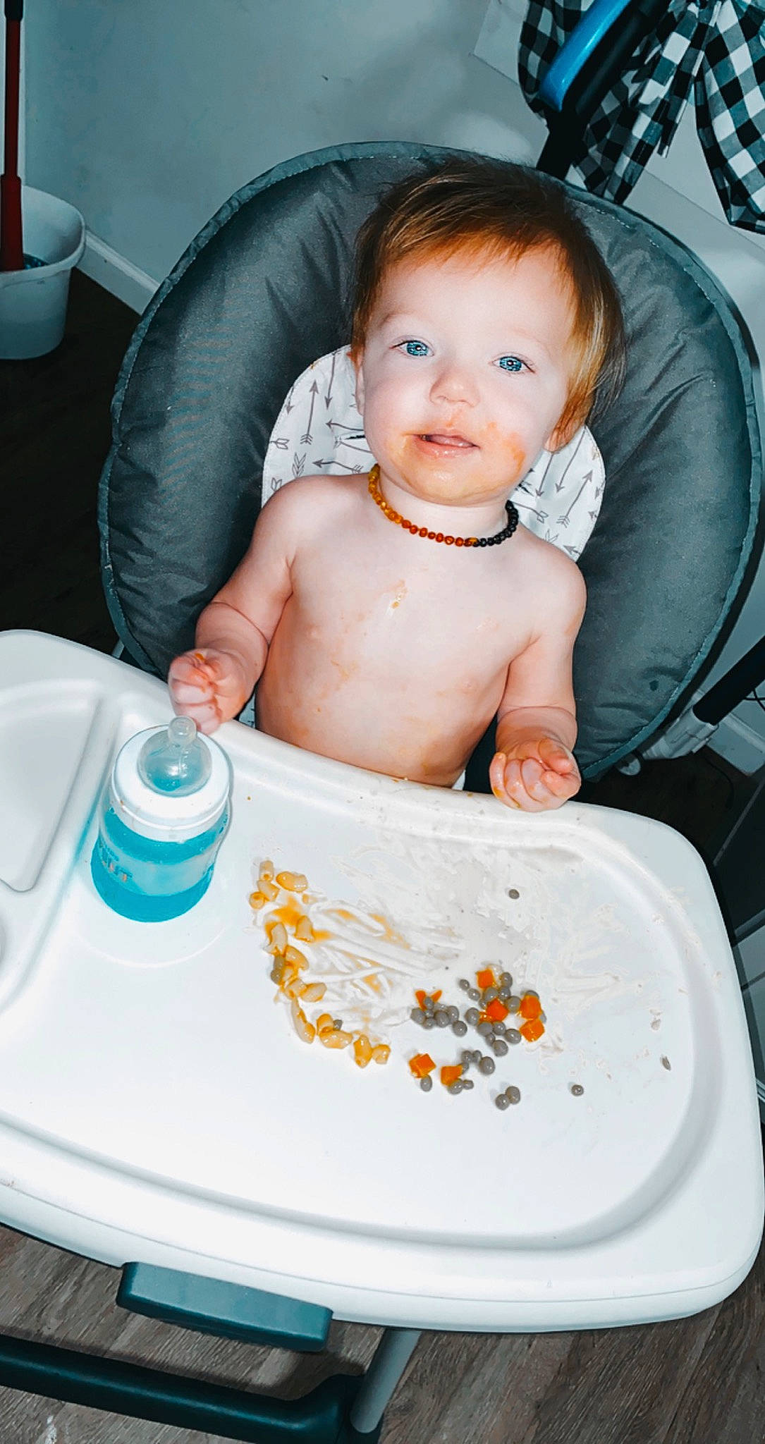 Kylen is registered to the contest to win money with this photo: baby, baby_food, baby_products, baby_safety, baby_toddler_clothing, bathing, blue, chair, cheek, child, dishware, drinkware, face, happy, nail, person, plate, serveware, smile, tableware