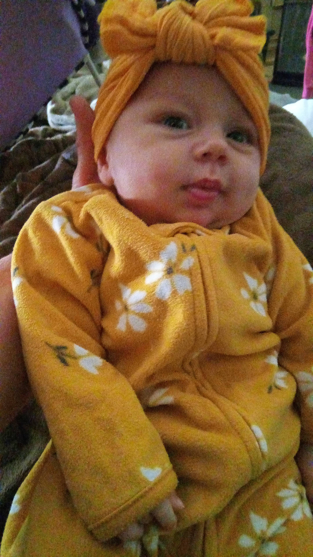 Genesis is registered to the contest to win money with this photo: baby, blanket, bonnet, clothing, coat, costume, face, fashion, fleece, hat, head, hood, jacket, newborn, person, photography, portrait, quilt, robe, towel