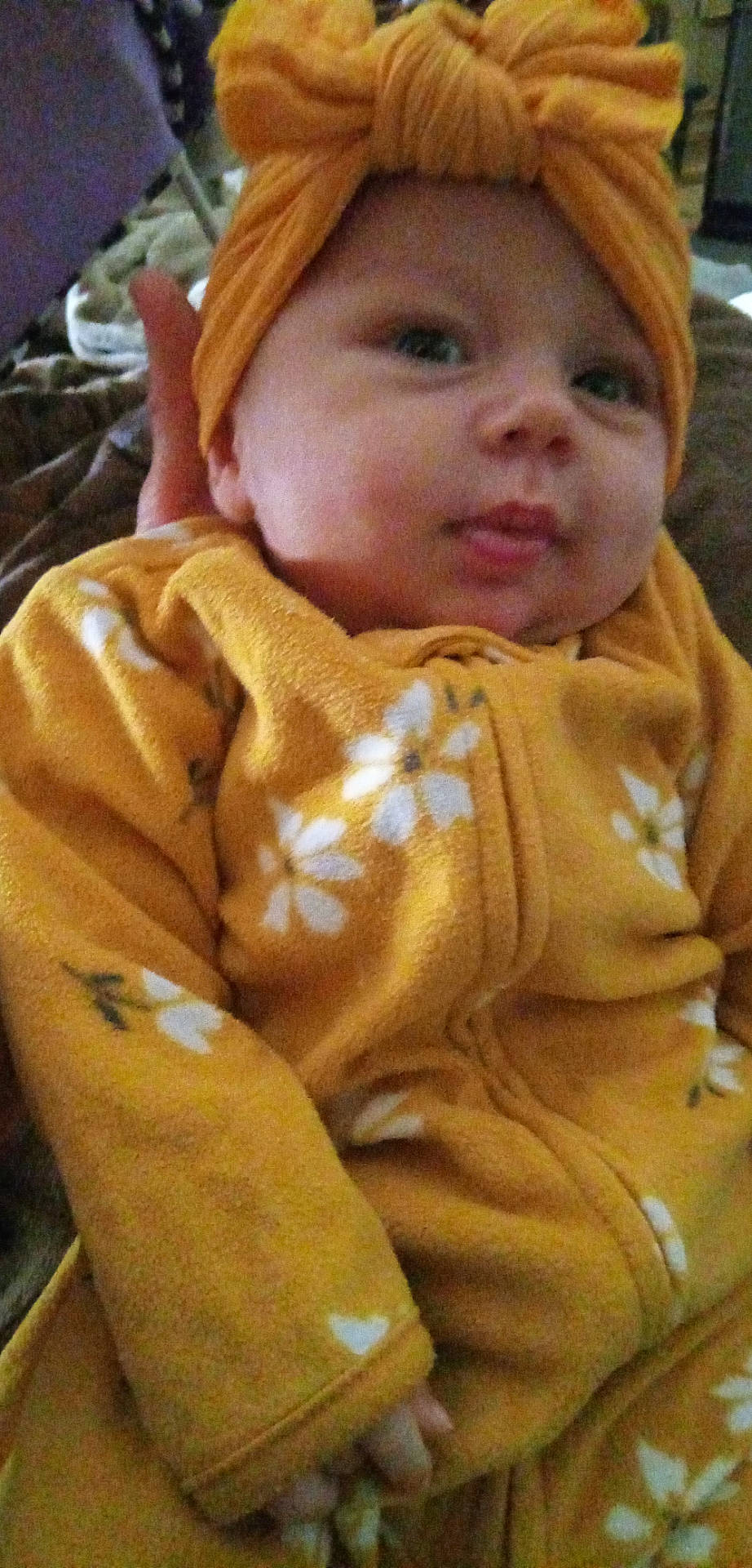 Genesis is registered to the contest to win money with this photo: baby, blanket, bonnet, clothing, coat, costume, face, fashion, fleece, hat, head, hood, jacket, newborn, person, photography, portrait, quilt, robe, towel