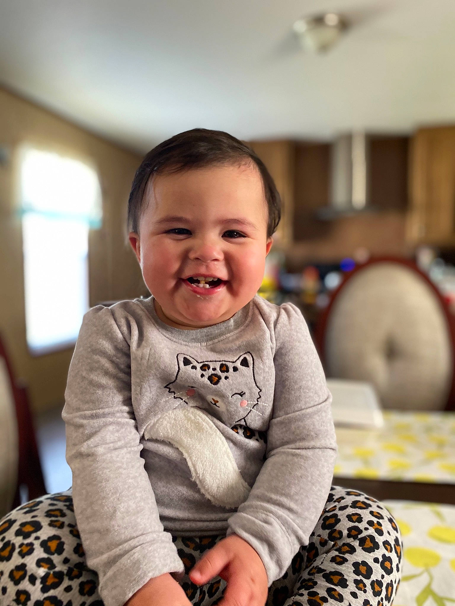 Kaisley joined the competition — help win amazing prizes! baby, baby_toddler_clothing, cheek, child, comfort, eye, flash_photography, flooring, fun, hairstyle, happy, iris, joy, pattern, person, room, sitting, skin, sleeve, smile