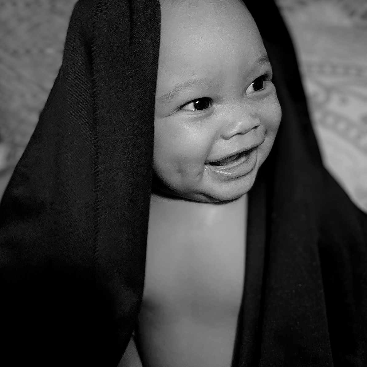Shy Onni joined the competition — help win amazing prizes! baby, blanket, bodypart, clothing, face, finger, hand, happy, head, hood, hoodie, knitwear, newborn, person, photography, portrait, smile, sweater, sweatshirt, towel